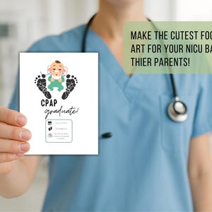 May include: A white card with a baby footprint design and the words "CPAP graduate!" is held by a person wearing blue scrubs. The card features a baby illustration and the text "Make the cutest footprint art for your NICU babies & their parents!"