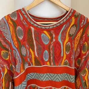 Orange shop coogi sweater