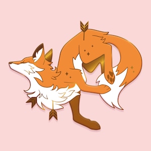 May include: A gold-toned fox pin with a curled tail and a stylized arrow design. The fox is depicted in a playful pose with its tail wrapped around its body.