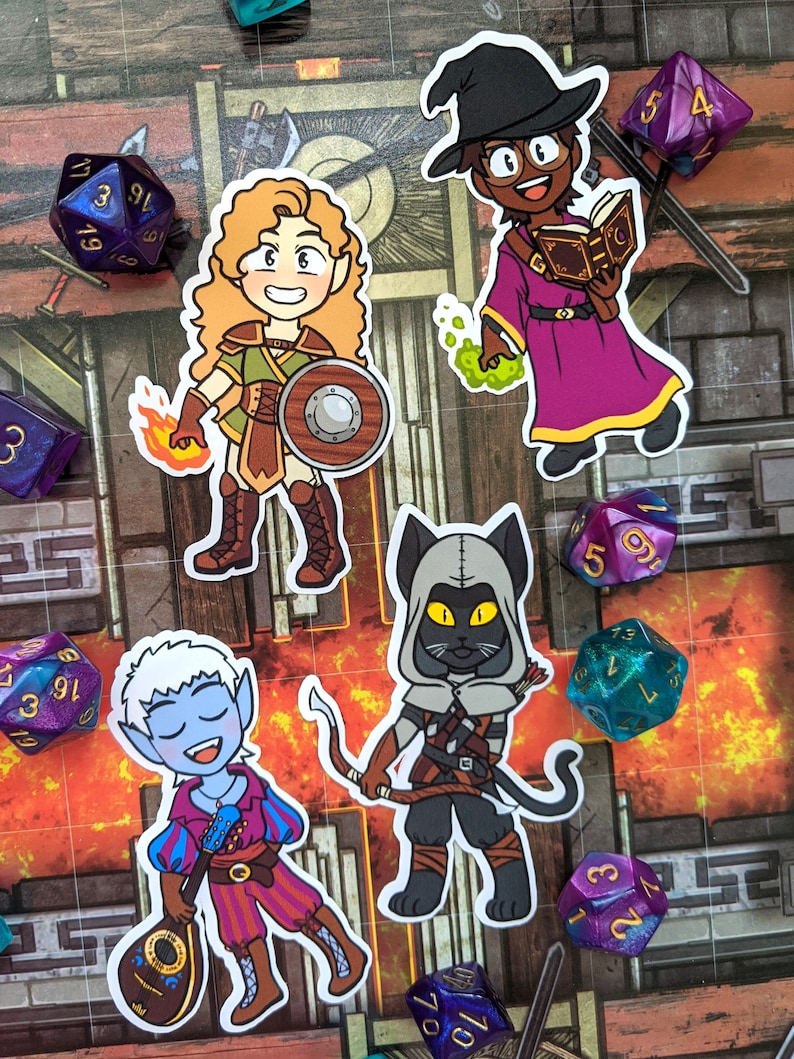 May include: Four illustrated stickers featuring fantasy characters. A female elf warrior with a shield and a sword, a cat-like creature with a hood and a bow and arrow, a female wizard with a pointed hat and a spell book, and a male elf bard with a lute.