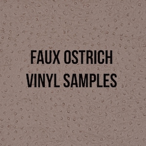 May include: A close-up of a textured, light brown faux ostrich vinyl fabric sample. The text "FAUX OSTRICH VINYL SAMPLES" is printed in black on the fabric.