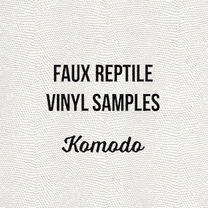 May include: White textured background with the words "FAUX REPTILE VINYL SAMPLES" in a bold, black font. Below, in a cursive font, is the word "Komodo".