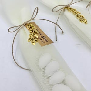Bomboniere con rami d'ulivo, bomboniere per matrimonio, boubouniere con rami d'ulivo, boubouniere per battesimo greco-ortodosso, boubouniere greche, koyfeta