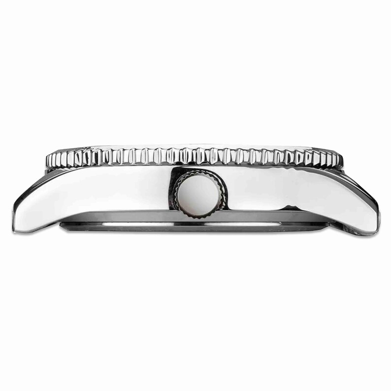 May include: Side profile of a silver wristwatch. The watch has a textured bezel, a circular crown, and a curved case. The watch has a polished finish and a minimalist design.