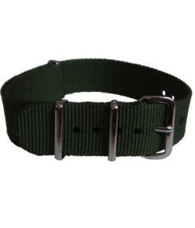 May include: A dark green nylon watch strap with silver hardware.