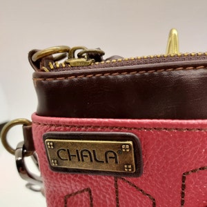 Chala shoulder handbag pig pink and brown 8 in L X 6 in W X .5 in D. Multi color diamond pattern strap image 3