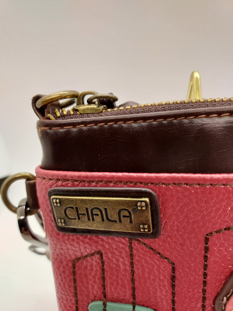 Chala shoulder handbag pig pink and brown 8 in L X 6 in W X .5 in D. Multi color diamond pattern strap image 3