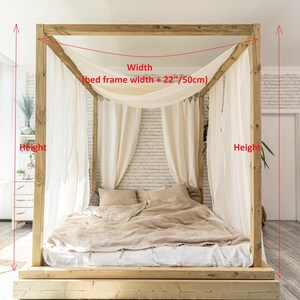 May include: A wooden canopy bed frame with a white linen canopy. The bed has a beige linen comforter and pillows. The bed frame is 22 inches wide and the canopy is 50 centimeters wide. The formula for calculating the length of the bed is: Length = 2 x Height + Width.