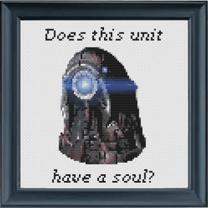 May include: A black and white cross-stitch pattern with a robot head and the text "Does this unit have a soul?"