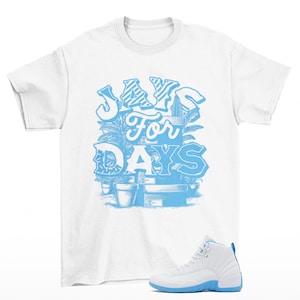 Stacked Jordan 12 Melo university Blue Sneaker Matching Tee Shirt