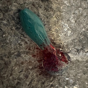 May include: A set of three ceramic mugs with a speckled, matte finish. The mugs are in shades of cream, light gray, and dark gray. Each mug has a simple, minimalist design, perfect for coffee or tea.