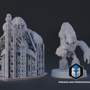 May include: Two gray 3D-printed miniature figures. One is a complex structure with intricate supports, and the other is a humanoid robot with a detailed design. The figures are on a dark background. The logo and website address are visible.