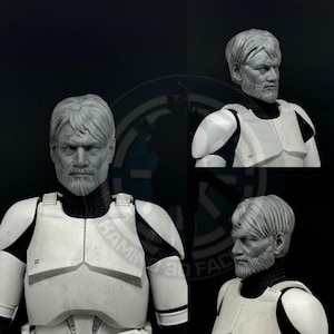 May include: A close-up of three unpainted plastic action figure heads. The heads are of a man with a beard and short hair. The heads are in various poses.