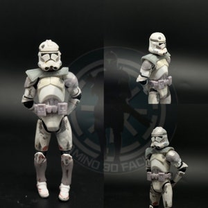 May include: Three white and gray Star Wars Clone Trooper action figures with weathered paint. The figures are posed in different stances and have detailed armor and weapons.