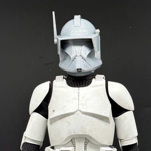 May include: A set of three ceramic nesting bowls in shades of blue, green, and white. The bowls feature a speckled glaze and a simple, modern design. The largest bowl measures approximately 6 inches in diameter.