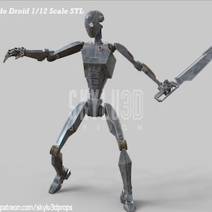 May include: A silver-colored robot with a sword-like weapon in its right hand. The robot is standing in a fighting pose with its left arm extended. The robot has a red light on its chest. The image is labeled "Commando Droid 1/12 Scale STL" and "1/5".