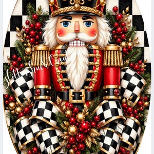 May include: An oval-shaped decorative nutcracker figure wearing a red and black uniform with gold accents, a tall hat with a red jewel, and a white beard. The figure is surrounded by pine branches, red berries, gold ornaments, and a black and white checkered ribbon.