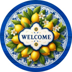May include: A round blue and white welcome sign with a wreath of lemons and green leaves. The sign says "WELCOME" in a white banner.