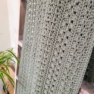 This image is a close up of this crochet wrap pattern, showing the stitch work.