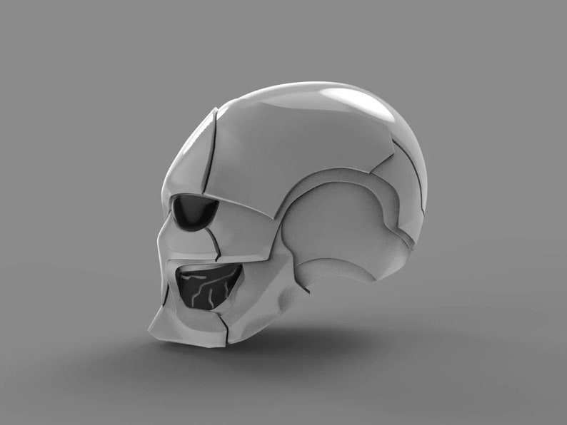 May include: A white, futuristic-looking skull helmet with a detailed design. The helmet has a single eye opening and a segmented, textured surface.