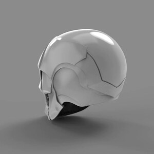 May include: A white helmet with a futuristic design. The helmet has a smooth, glossy finish and features intricate details on the side.