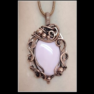 Peruvian pink opal pendant in solid copper