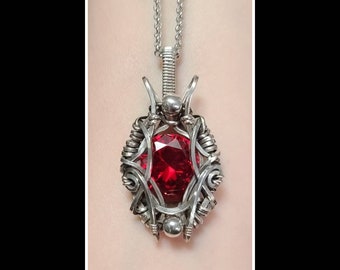 Solid sterling silver and red zirconia unique wirework pendant