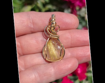 Golden rutilated quartz pendant in 14k gold filled wire