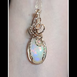 5.59 carat natural Ethiopian opal pendant in rose gold
