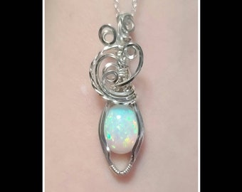 Swirly 3.65 carat opal pendant in solid sterling silver