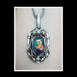 9.25 rainbow smoked Ethiopian opal pendant in solid sterling silver