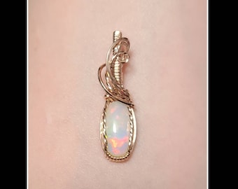 Mini Ethiopian opal pendant in rose gold filled wire 1.82 carat