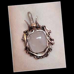 Rose quartz pendant in solid copper