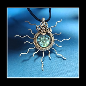 Blue labradorite sun pendant in silver