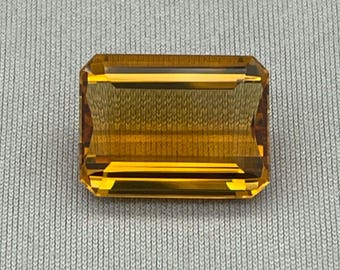 Natural Citrine. 10.25 Carat Emerald Cut Faceted Gemstone.