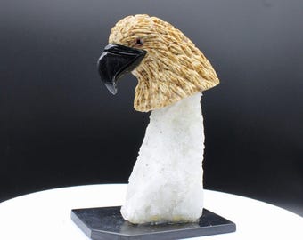 Natural Brown Aragonite Eagle Head With Onyx Beak Carving, On A Fine White Quartz Base.