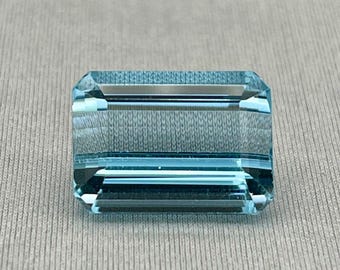 Natural Blue Topaz. 21.15 Carat, Emerald Cut Faceted Earth-Mined Gemstone.