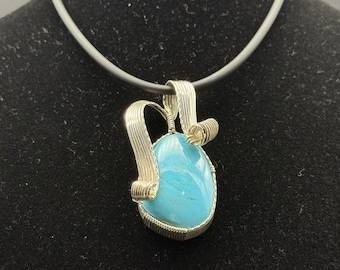 Handcrafted Natural Earth-Mined Turquoise Pendant set in Silver Filigree.