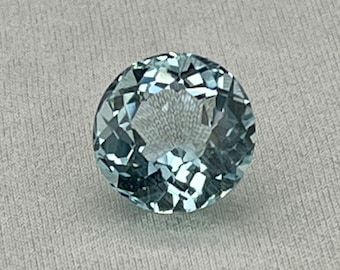 Natural Aquamarine. 7.15 Carat Faceted Round Gemstone.