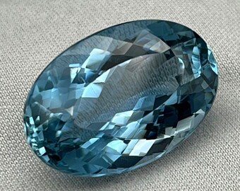 Blue Topaz, 21.34 Carat Natural Faceted Oval Cut Gemstone.