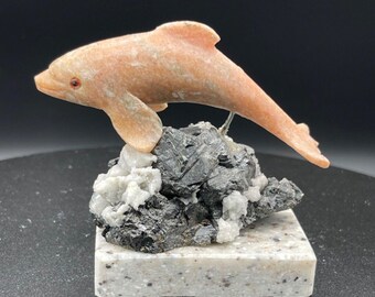 Natural Rhodonite Handcrafted Dolphin Carving, On A Mineral Quartz Base.