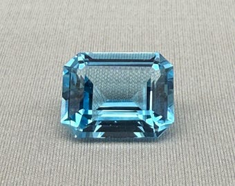 Natural Faceted Topaz. 14.92 Carat Emerald Cut Earth-Mined Gemstone.