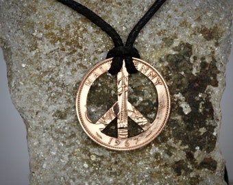 CND peace symbol made from a British Half Penny