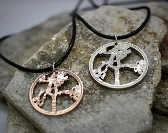 U2 Joshua Tree Pendant, made from vintage British half penny coin, cut with U2 image.