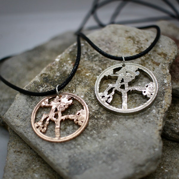 U2 Joshua Tree Pendant, made from vintage British half penny coin, cut with U2 image.