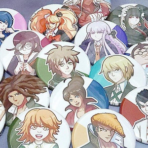 May include: A collection of 15 round button pins featuring anime characters with various expressions and poses. The buttons are white with colorful images of the characters.