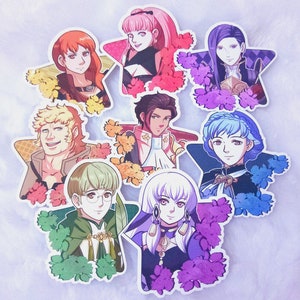May include: Eight colorful star-shaped stickers featuring anime-style characters with floral accents. The characters are depicted in various poses and expressions, with a mix of pink, blue, green, and purple flowers surrounding them.