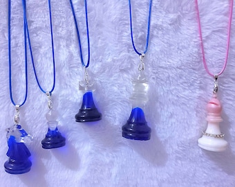 Chess piece necklaces