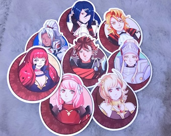 May include: Eight round stickers featuring anime-style portraits of characters with different hairstyles and clothing. The stickers have a red and brown background with a white border.