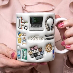 May include: A white ceramic mug featuring a 3D-style embossed design with various tech-themed icons including a laptop, headphones, programming language logos, a keyboard, a coffee cup with code, and the name Alex written in script font.
